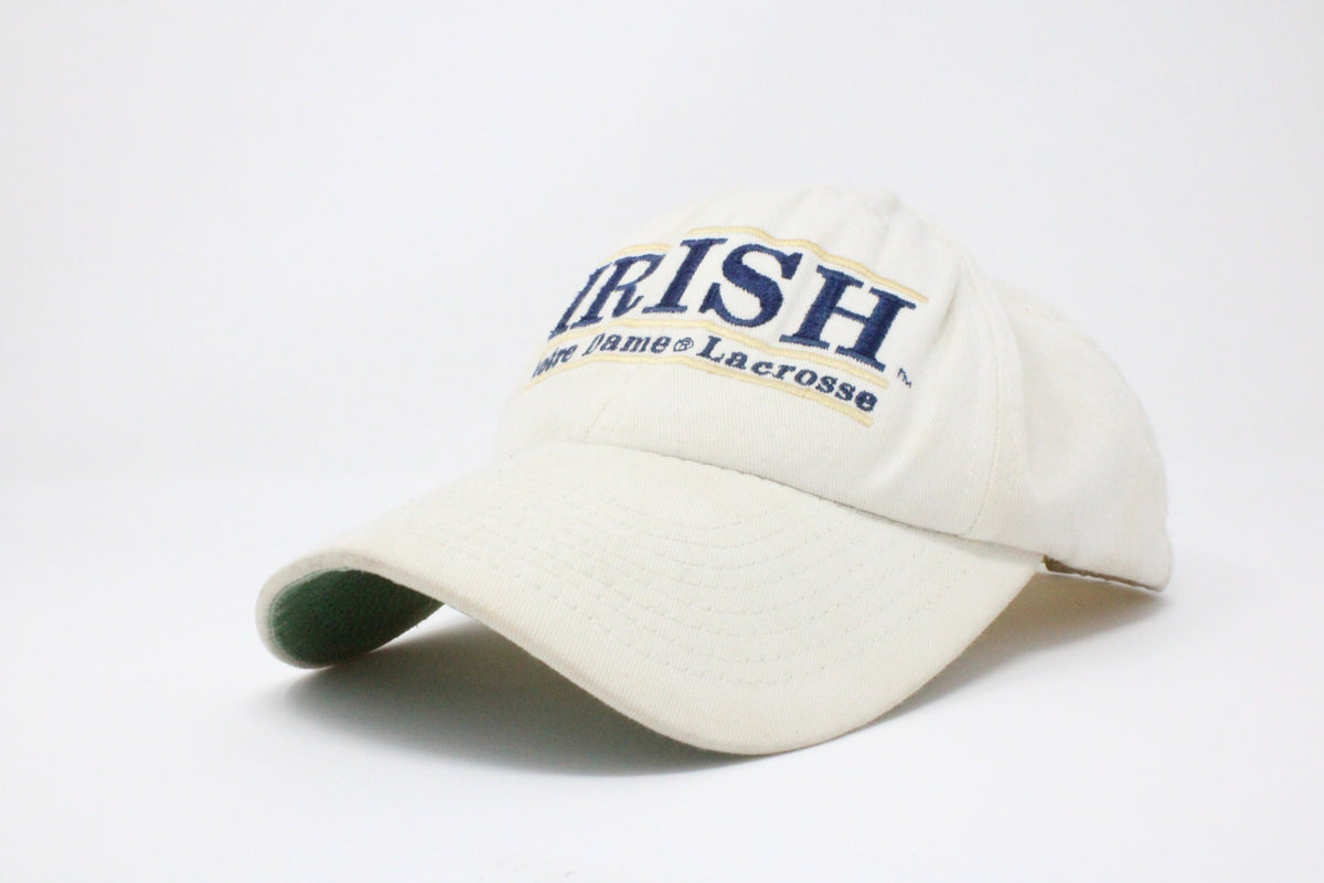Well-worn white IRISH Notre Dame Lacrosse hat